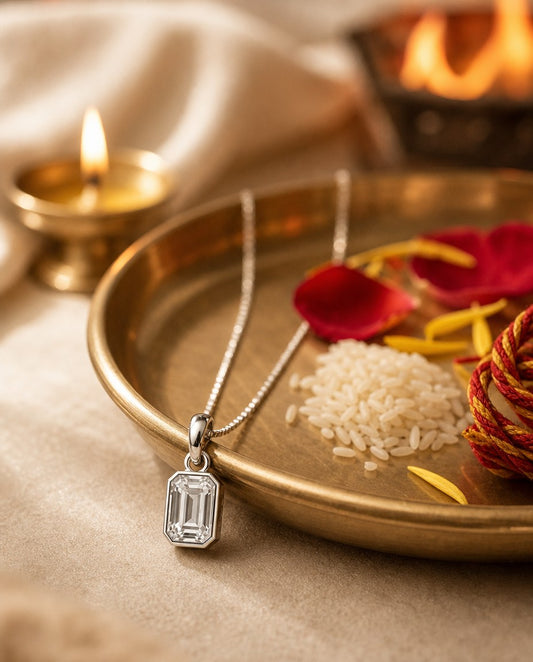 Mohini Maha-Sankalp silver pendant on a brass pooja thali with rice, petals and havan flame — Dharmikstone