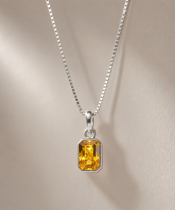 Silver Dhan Vriddhi Pendant with consecrated yellow stone on silver box chain — Dharmikstone