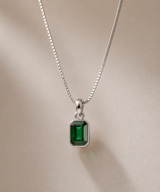Silver Raksha Pendant with consecrated green stone on silver box chain — Dharmikstone